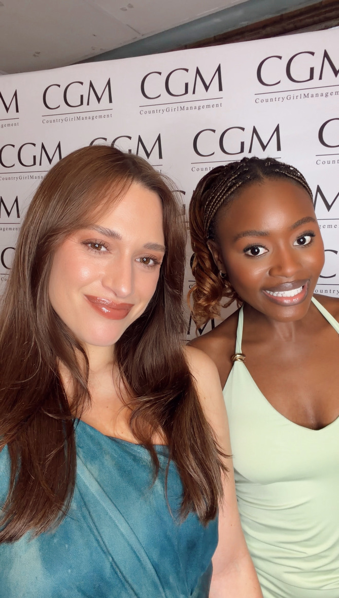 Alexandra Sarandis with an attendee at a Country Girl Management event