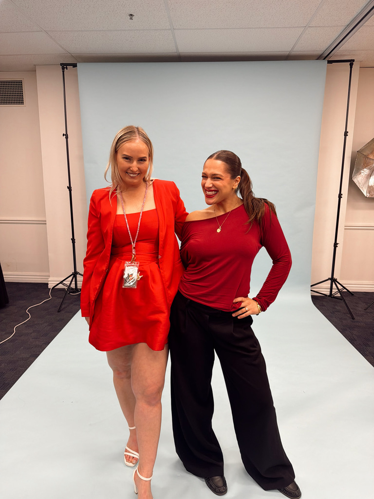 Alexandra Sarandis with a colleague at a live event